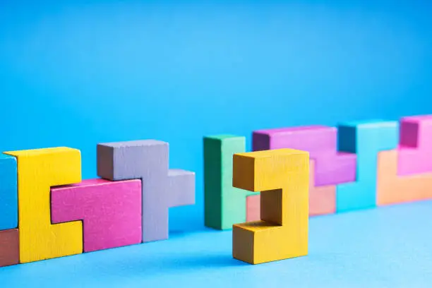 Photo of Geometric shapes on a blue background, close-up.