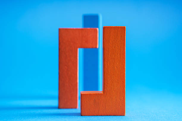 istock Blue wooden blocks on a blue background. 1286287417