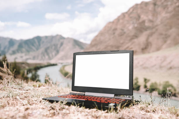 istock mockup laptop image, in the mountains 1286287710