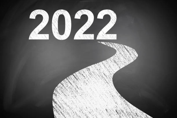 istock New year road to 2022 choice target blackboard 1286289740