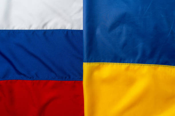 istock Flags of Russia and Ukraine folded together 1286295750
