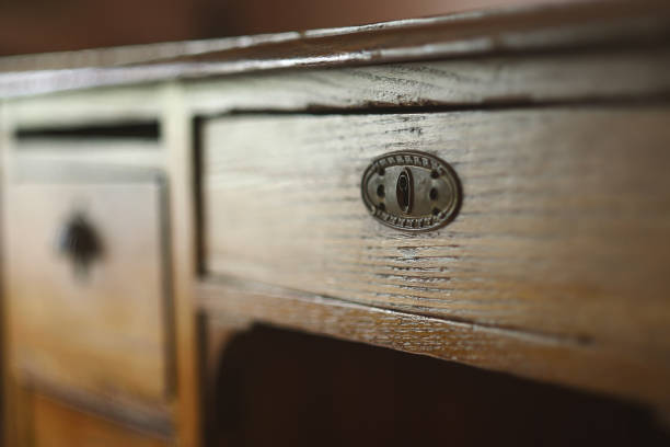 istock Antique lock bokeh on warm wood 1286300061