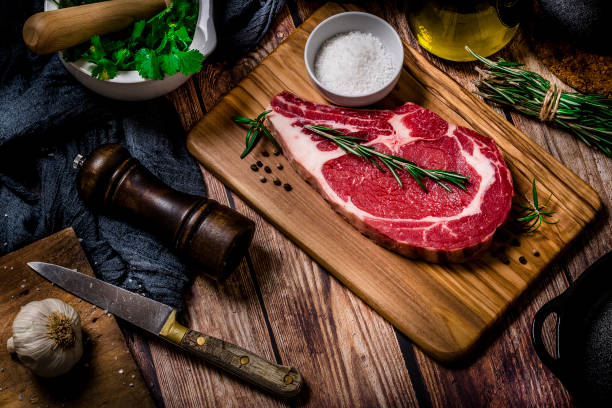 istock Meat chop on a rustic wooden table 1286300232