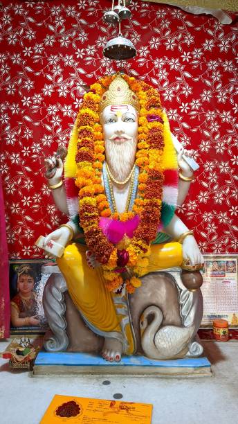 istock Lord Vishwakarma temple, Vishwakarma statue 1286300978