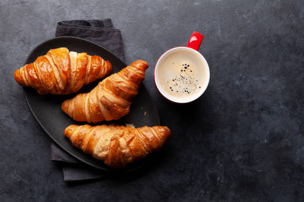 istock Espresso coffee and croissants for breakfast 1286301364