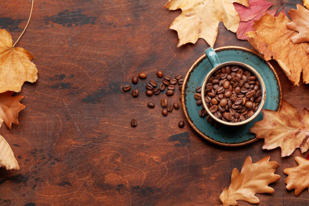 istock Coffee cup and autumn leaves 1286301456