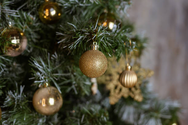 istock Beautifully decorated Christmas tree with golden balls. 1286304006