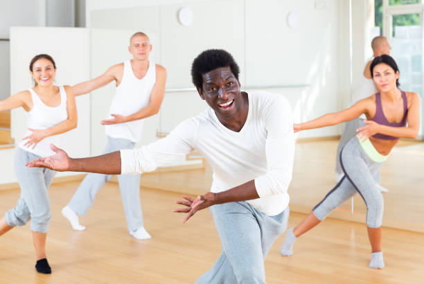 istock Cheerful african american man practicing vigorous dance movements 1286304160