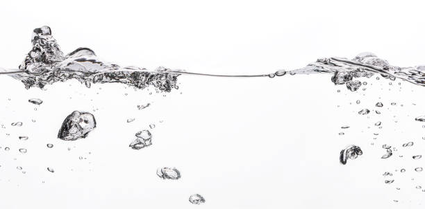 istock Water splash banner on white background. Water poured into tank, bubbles and splashes. 1286305993