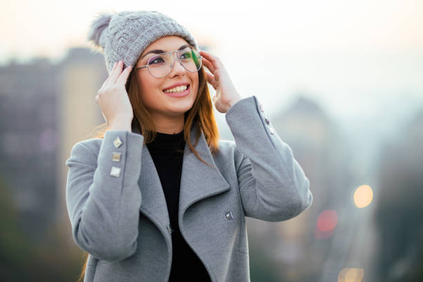 Cute smiling girl on rooftop stock photo