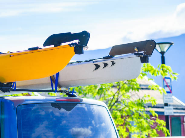 istock Car with canoe on top roof 1286311800