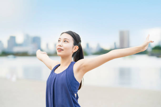 istock Young woman stretching and taking a deep breath 1286312664