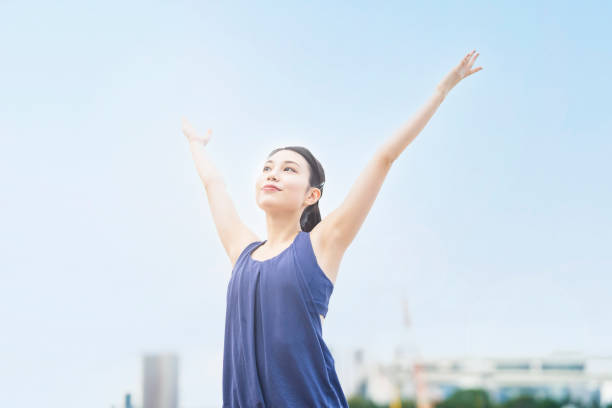 istock Young woman stretching and taking a deep breath 1286312718