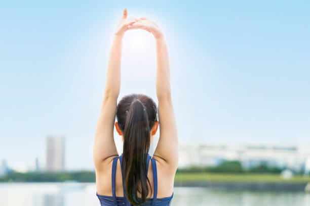 istock Young woman stretching and taking a deep breath 1286312759