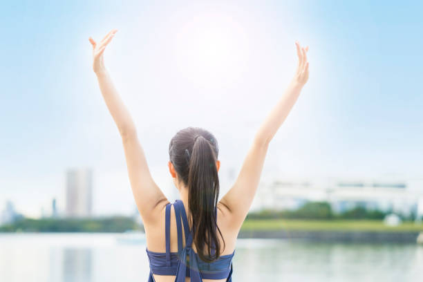 istock Young woman stretching and taking a deep breath 1286312897