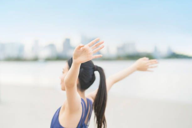 istock Young woman stretching and taking a deep breath 1286312995