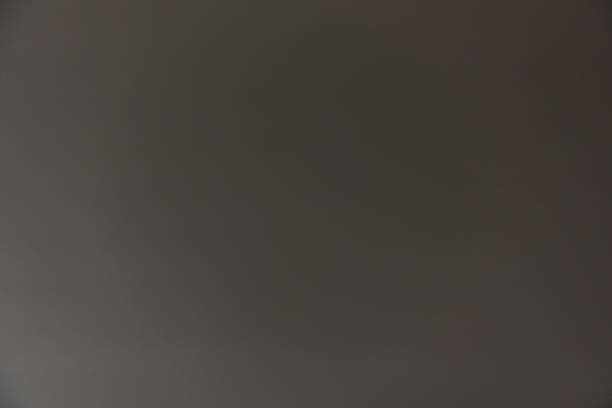 istock Abstract blurred gray black background for backdrop design, composition for , website, magazine or graphic for commercial campaign design. 1286313089