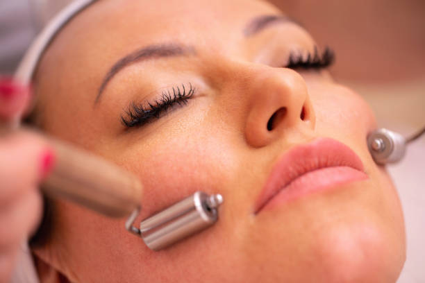 istock Facial massage with face skin care tools 1286316977