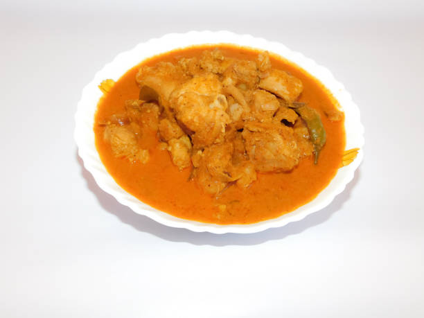 istock delicious dish (Kerala Chicken curry)in a bowl isolated on white background closeup view 1286321046