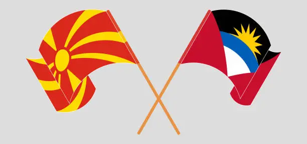 Vector illustration of Crossed and waving flags of Antigua and Barbuda and North Macedonia