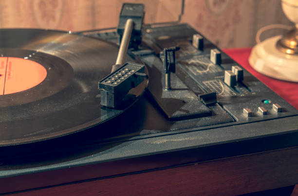 istock Old dusty turntable. Vinyl discs. Retro sketch 1286323105