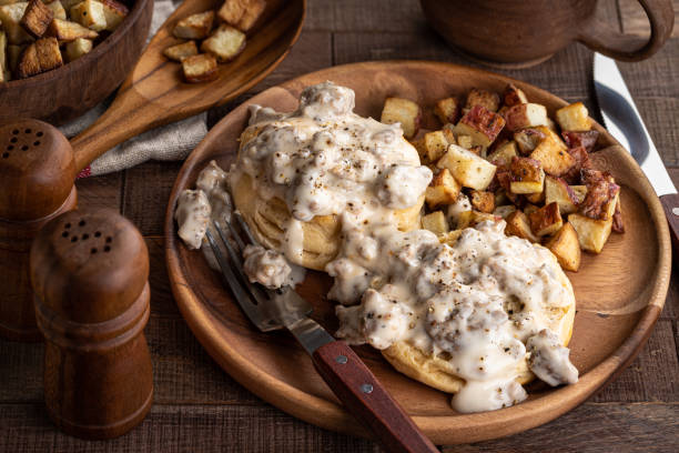 istock Biscuits and Sausage Gravy with Fried Potatoes 1286323991