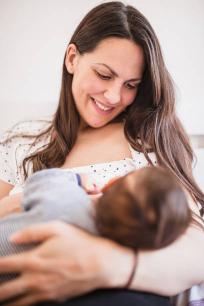 istock Mother Breastfeeding Baby Boy 1286327922