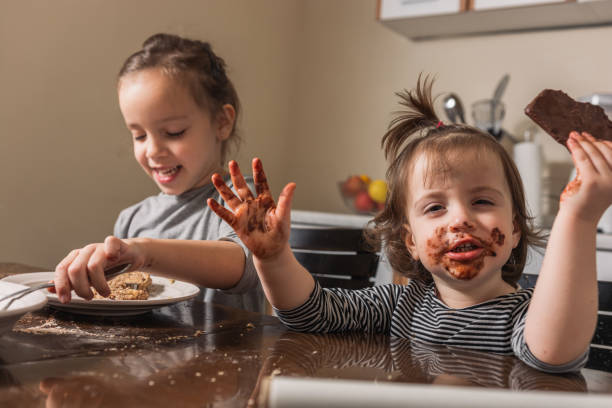 istock Children making cookies at home 1286329237