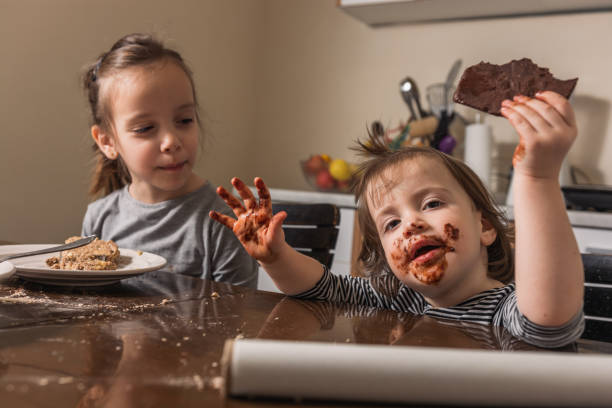istock Children making cookies at home 1286329578