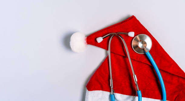 istock Christmas theme in medicine. The stethoscope is on Santa's hat 1286329809