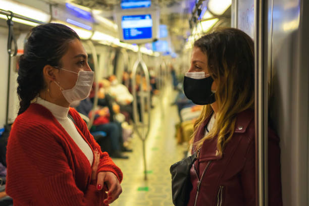 istock two women travel by subway 1286330065