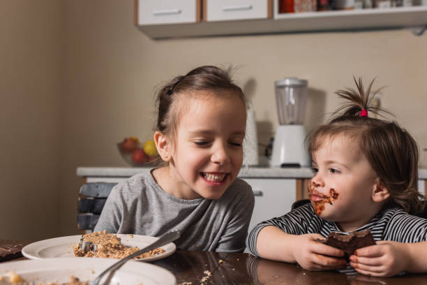istock Children making cookies at home 1286331060