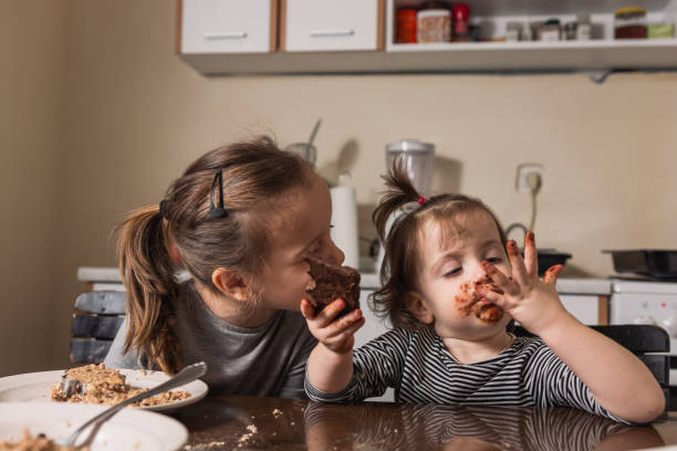 istock Children making cookies at home 1286331197