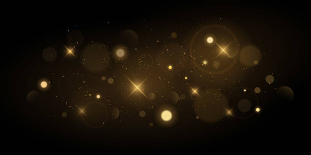 istock Abstract lights bokeh on a black background. Glare from fire or Christmas fireworks. Glittering stars and and blurry spots in motion. Vector illustration 1286332075