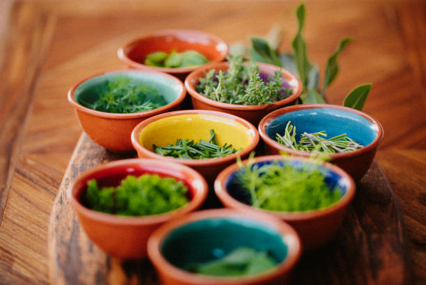 istock Eight different tasty herbs on a rustic wooden board with focus on the chive 1286332218