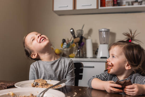 istock Children making cookies at home 1286332871