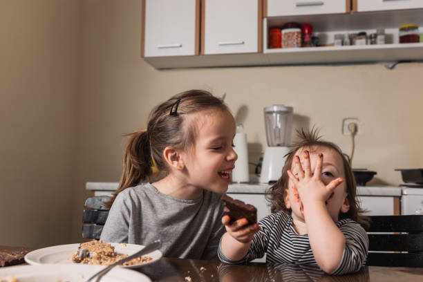 istock Children making cookies at home 1286334155