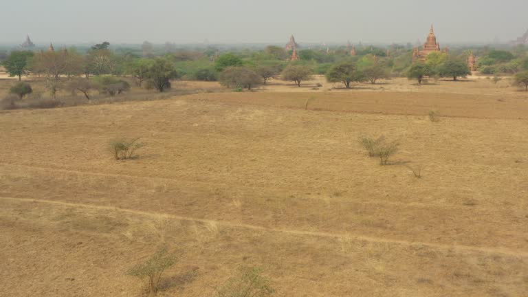 View from above, stunning aerial view of the Bagan Archaeological Zone at sunset.