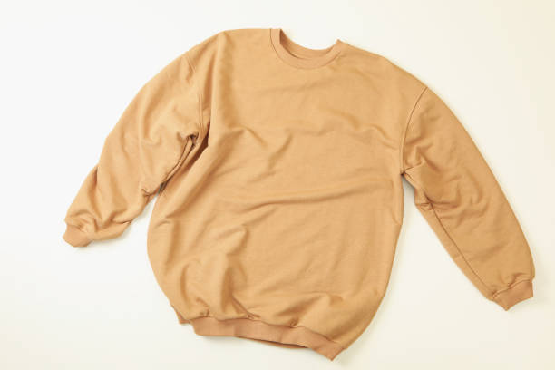 istock Blank beige sweatshirt on white background, top view 1286335943