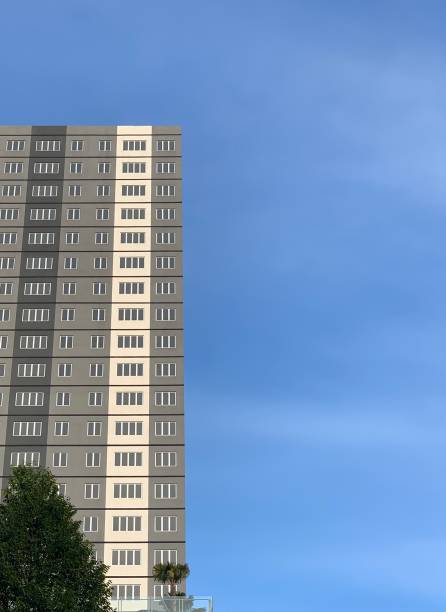 istock Symmetrical building and blue skies 1286337037