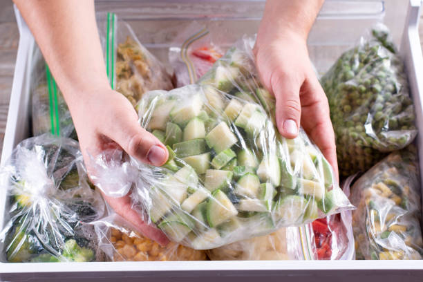 istock Frozen zucchini. Frozen vegetables in a plastic bag in refrigerator 1286337296