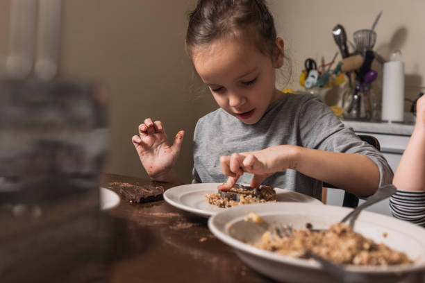 Child making cookies at home
