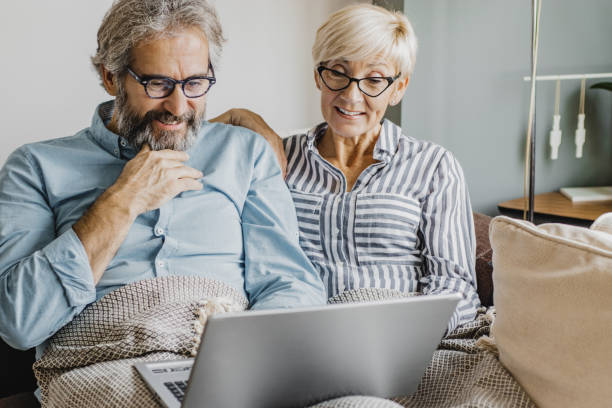 istock Seniors are using laptop at home 1286340025