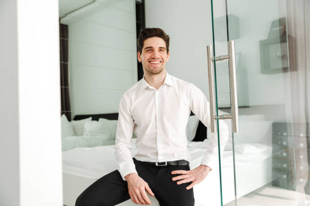 istock Happy smiling young businessman indoors 1286341038
