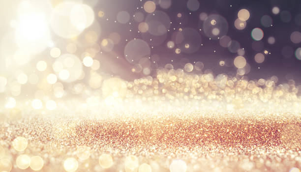 istock Sparkling lights, bokeh festive background with texture. 1286344890
