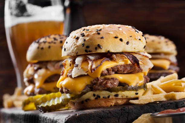 istock Double Cheese Burger Sliders with Fried Onions, Pickles on a Brioche Sesame Seed Bun 1286345820