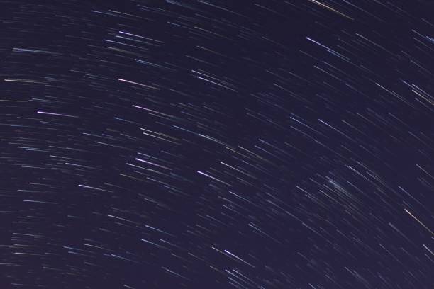 istock star trail in dark starry night sky 1286347426