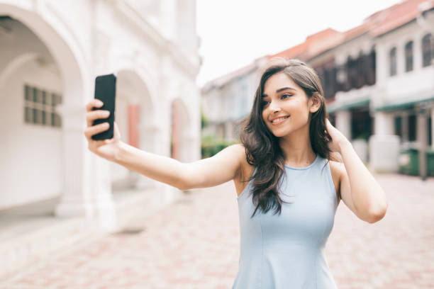 istock Happy woman taking a selfie 1286350756