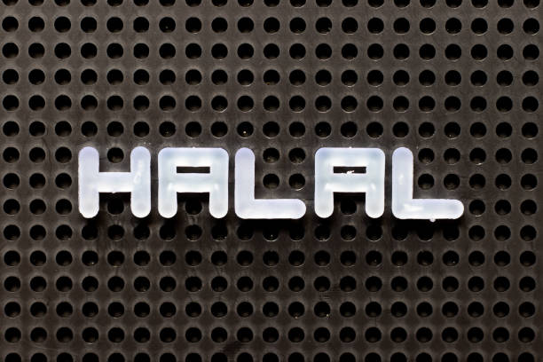 istock White color alphabet with word halal on black pegboard background 1286350862
