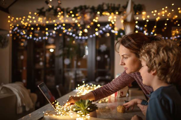 istock Mother and son making cookies 1286351761